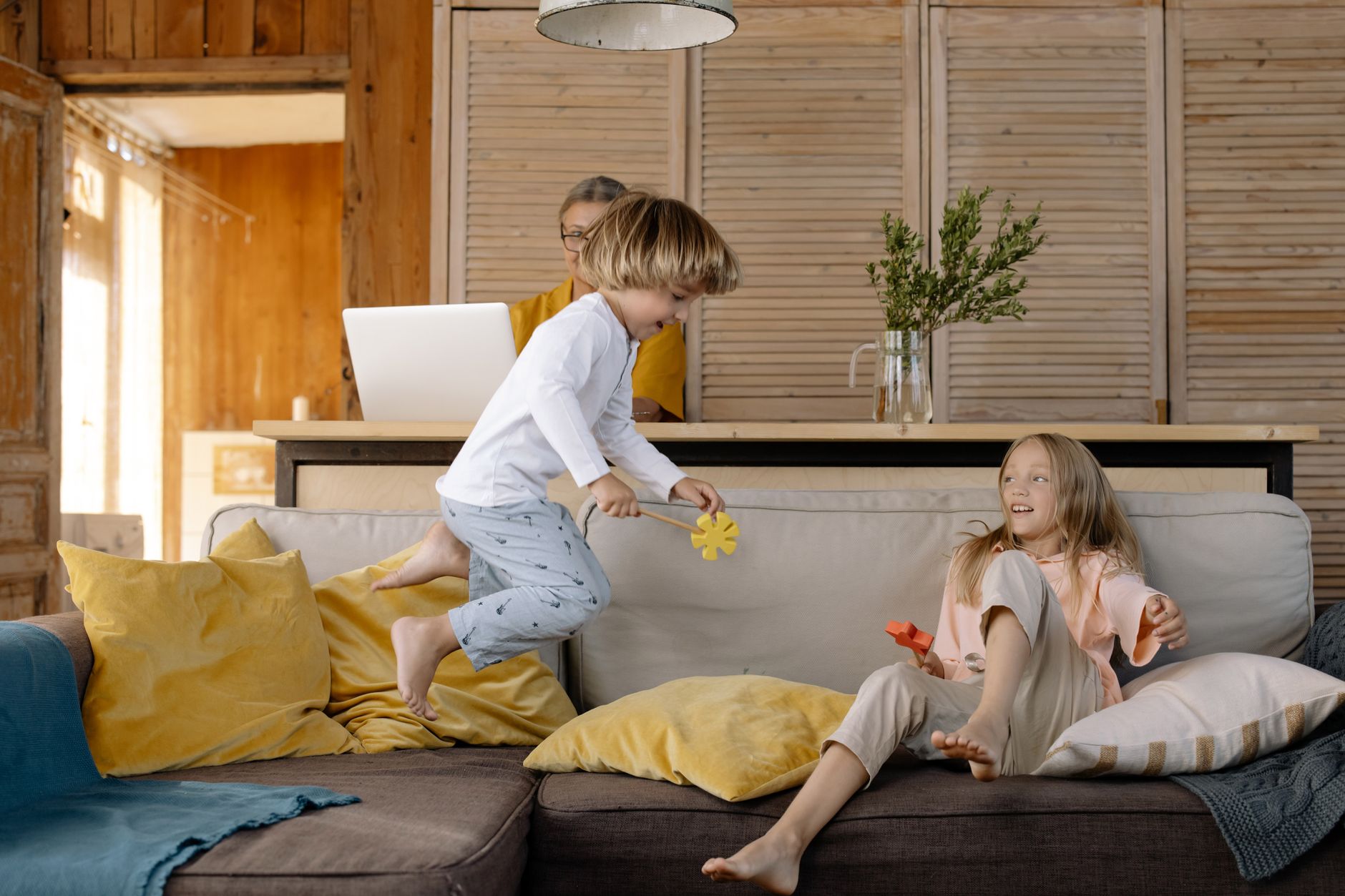 Happy family in warm home with lower energy bills after insulation upgrade