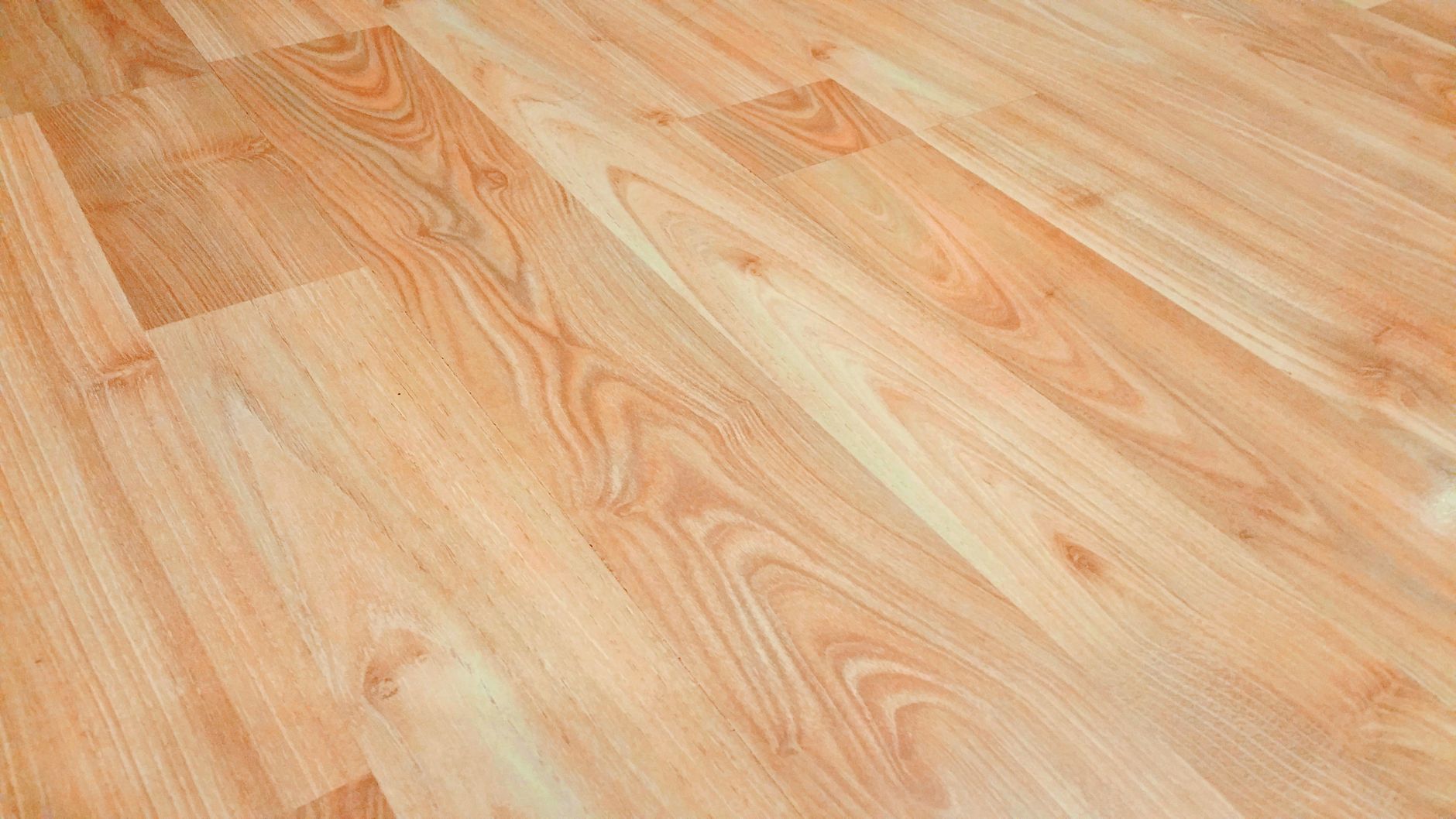 Hardwood flooring boards laid out in a room interior