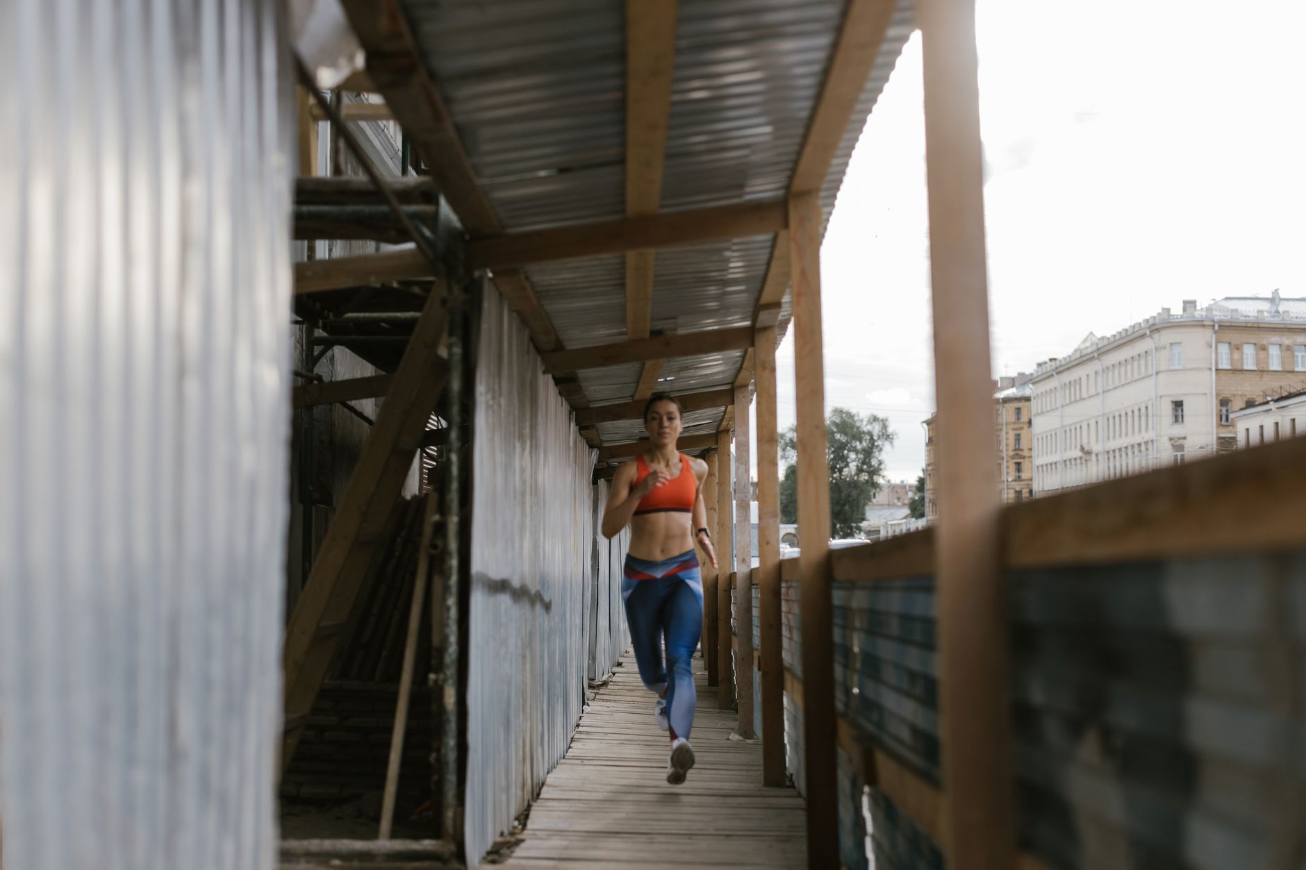 Runner training outdoors using heart rate monitor on wrist