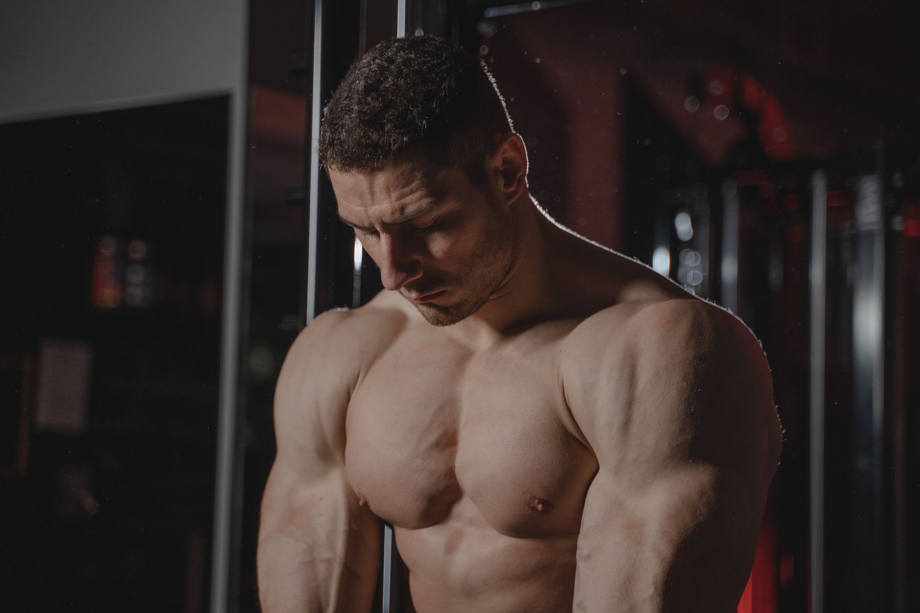 Athlete tracking body composition with gym workout and scale