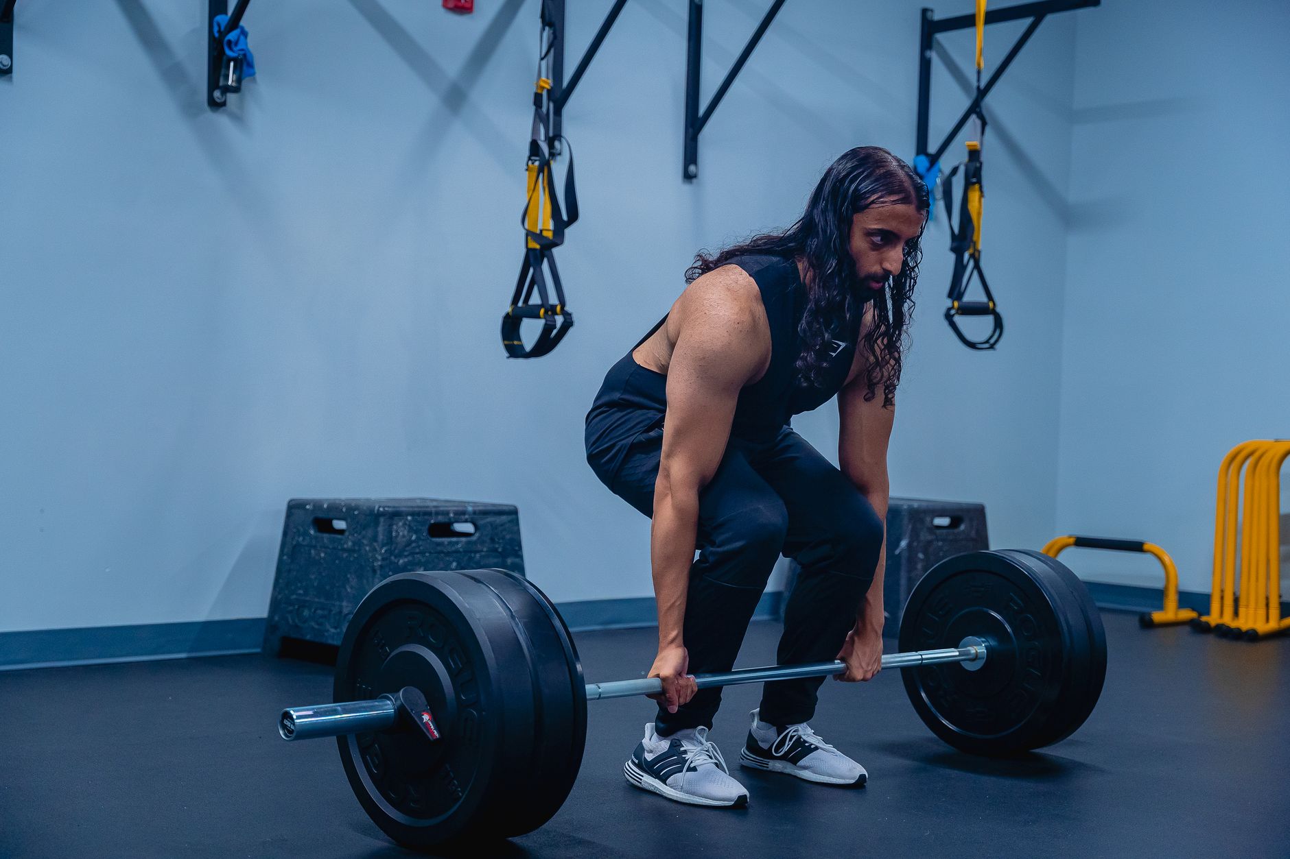 Athlete performing a deadlift as part of strength training