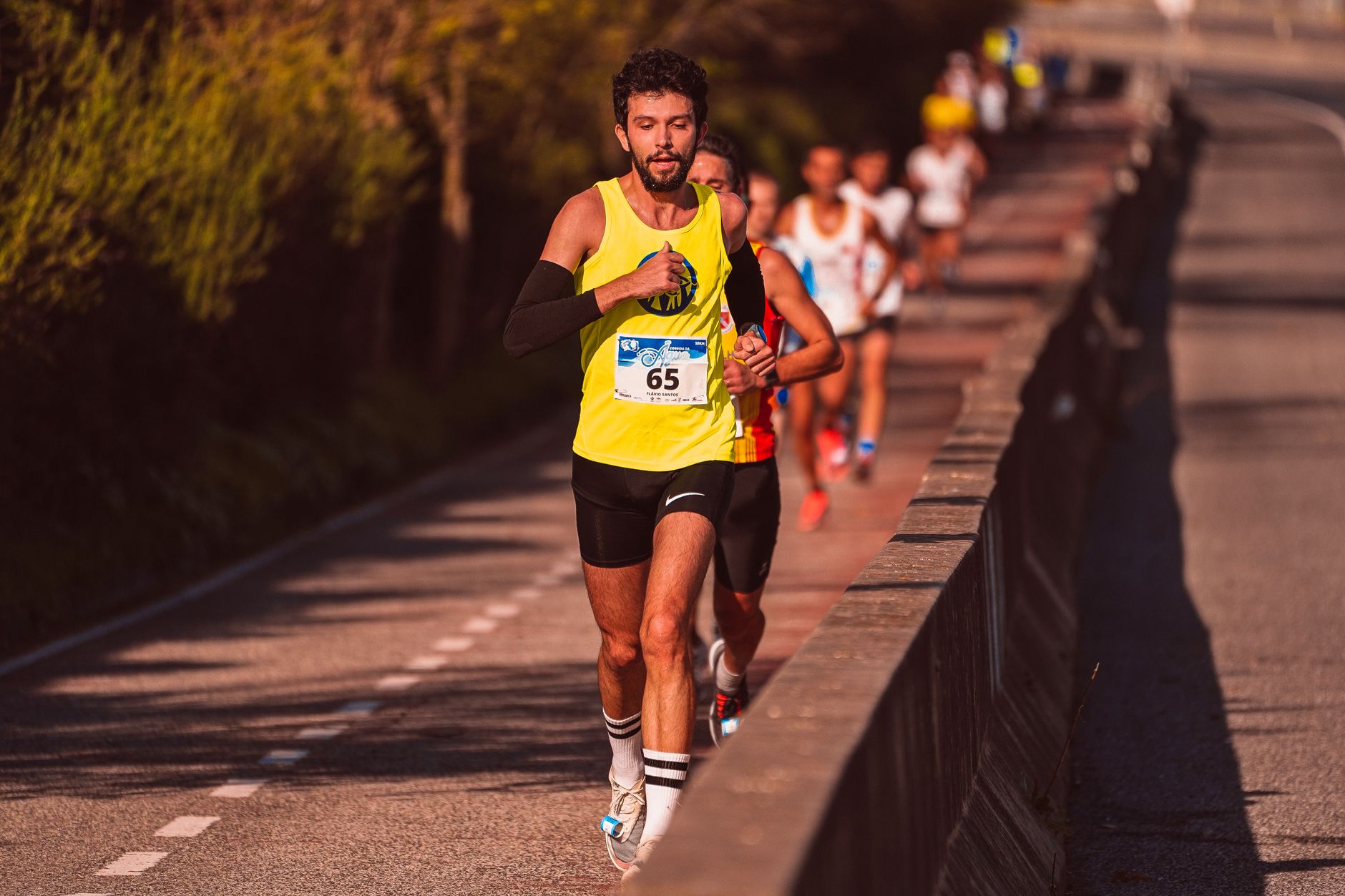 Runner setting their running pace on a marathon course