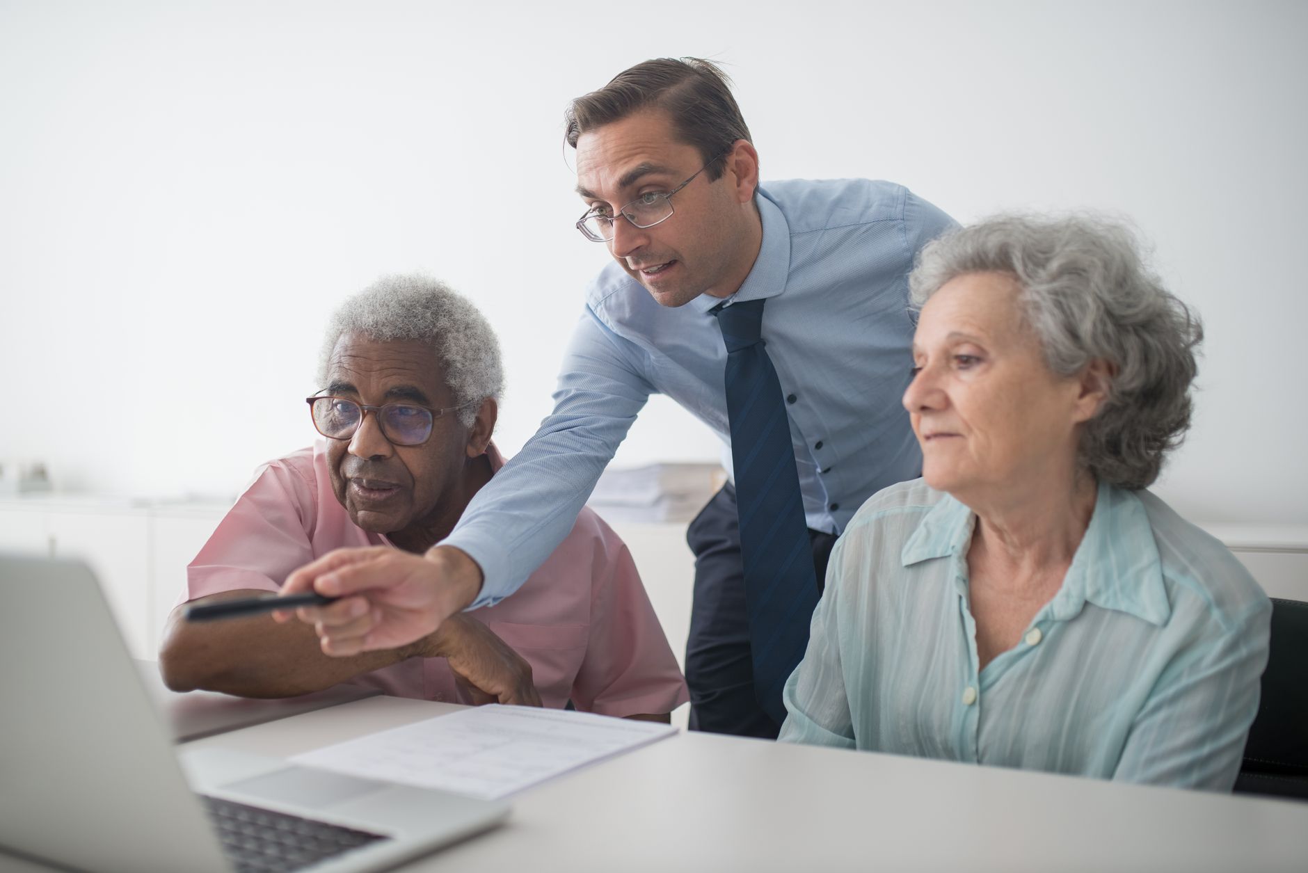 Financial advisor explaining refinance options to clients