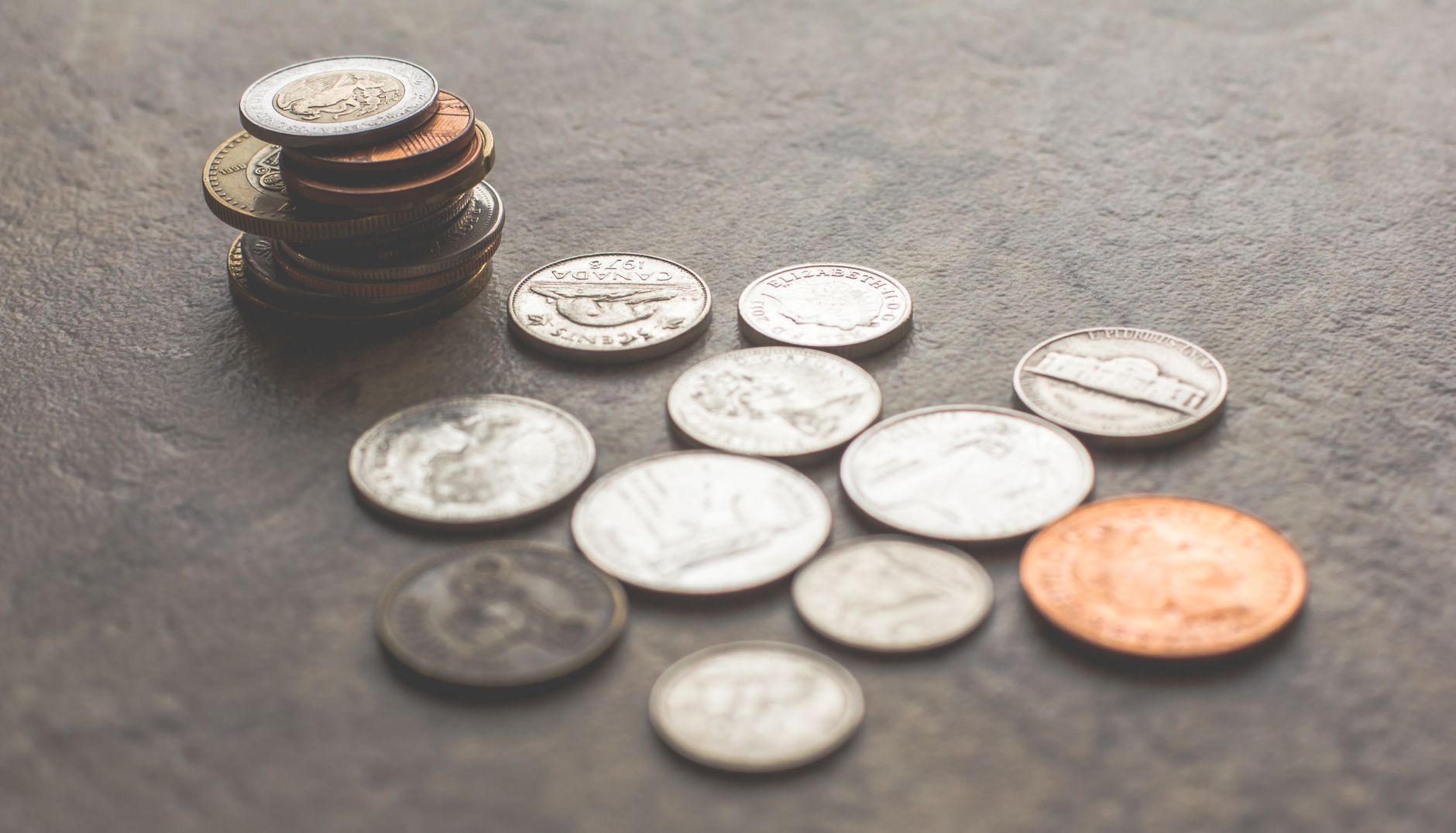 Stacked coins showing steady linear growth typical of simple interest