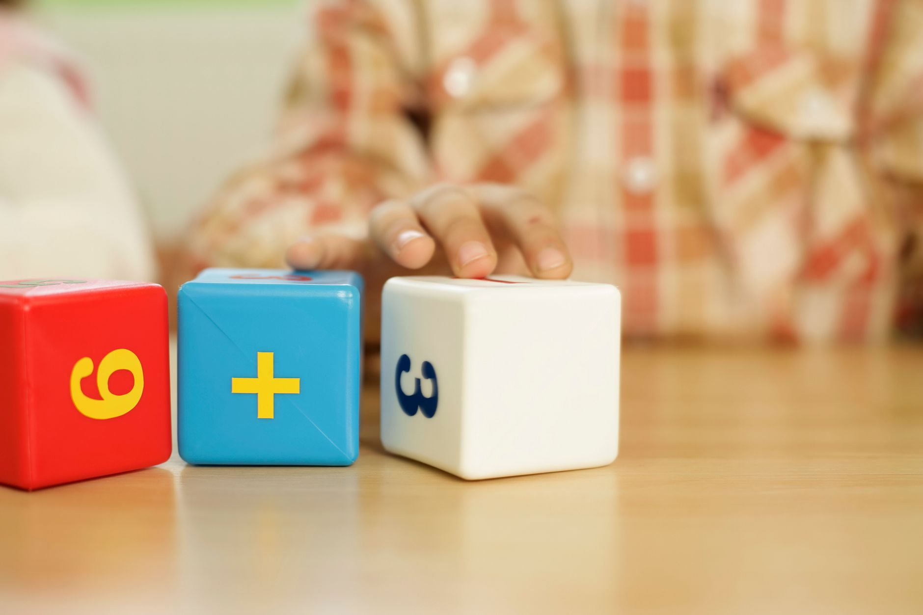 Colorful fraction blocks used to teach parts of a whole in the classroom