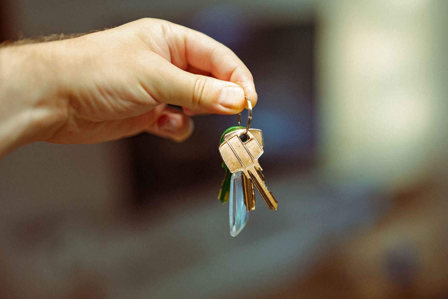 New homeowner holding house keys