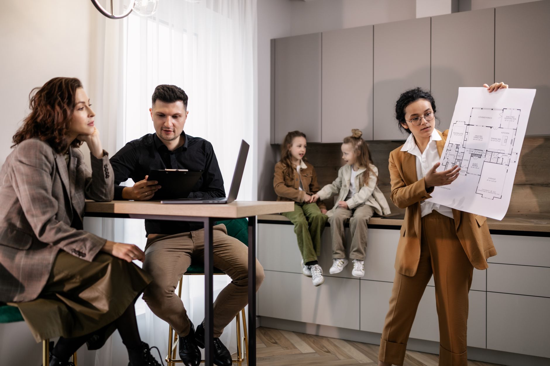 Family reviewing home finances and planning a budget
