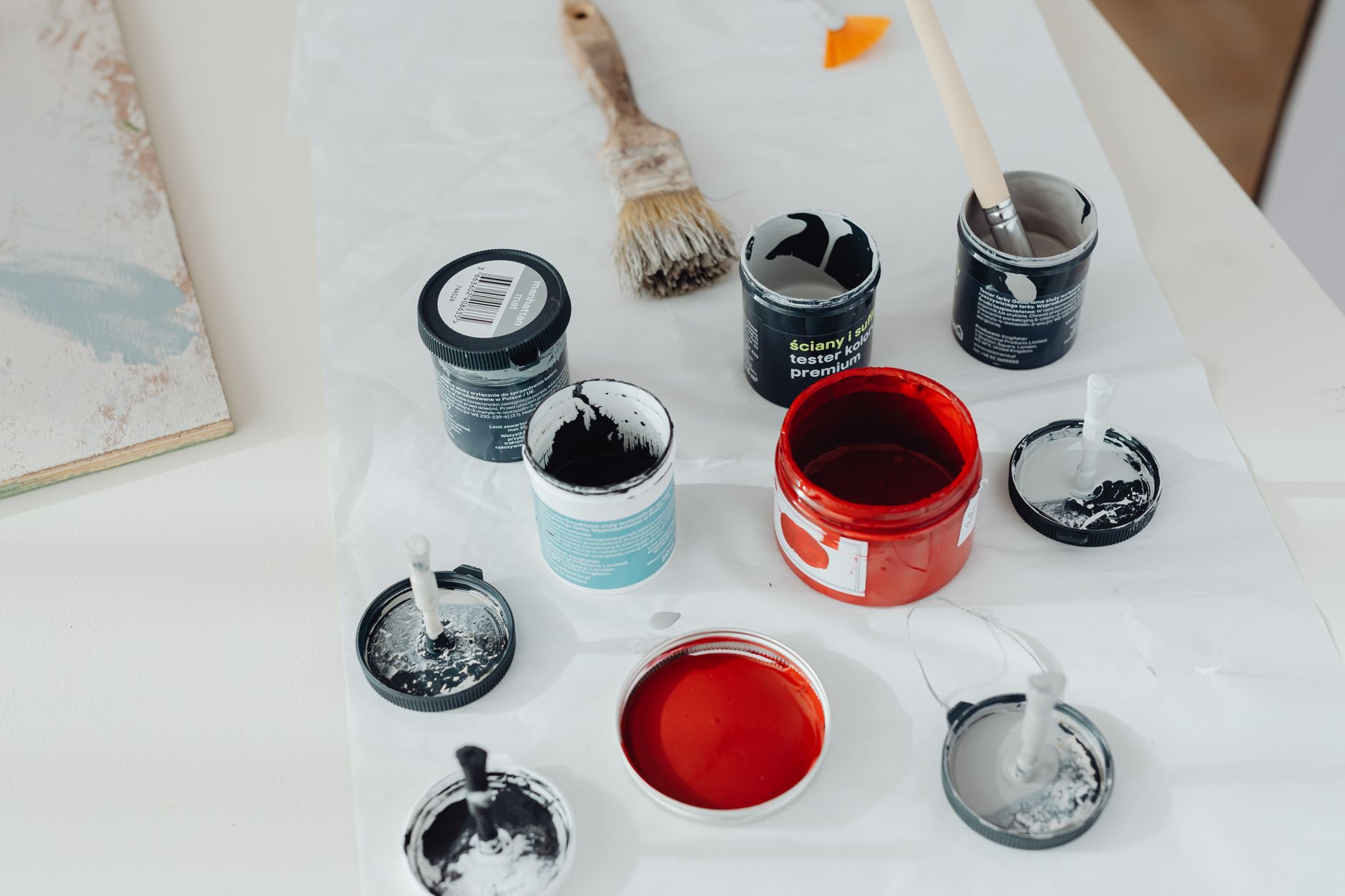 Paint cans and brushes for home improvement project